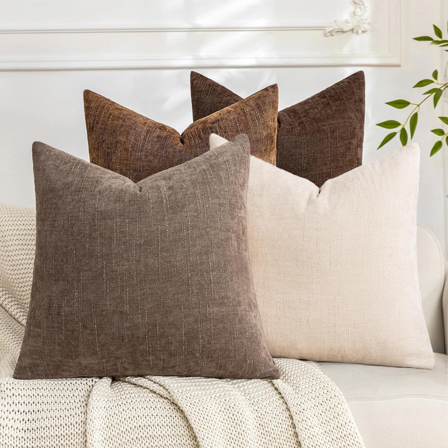 Neutral brown, taupe and ivory textured pillow covers for a Western living room